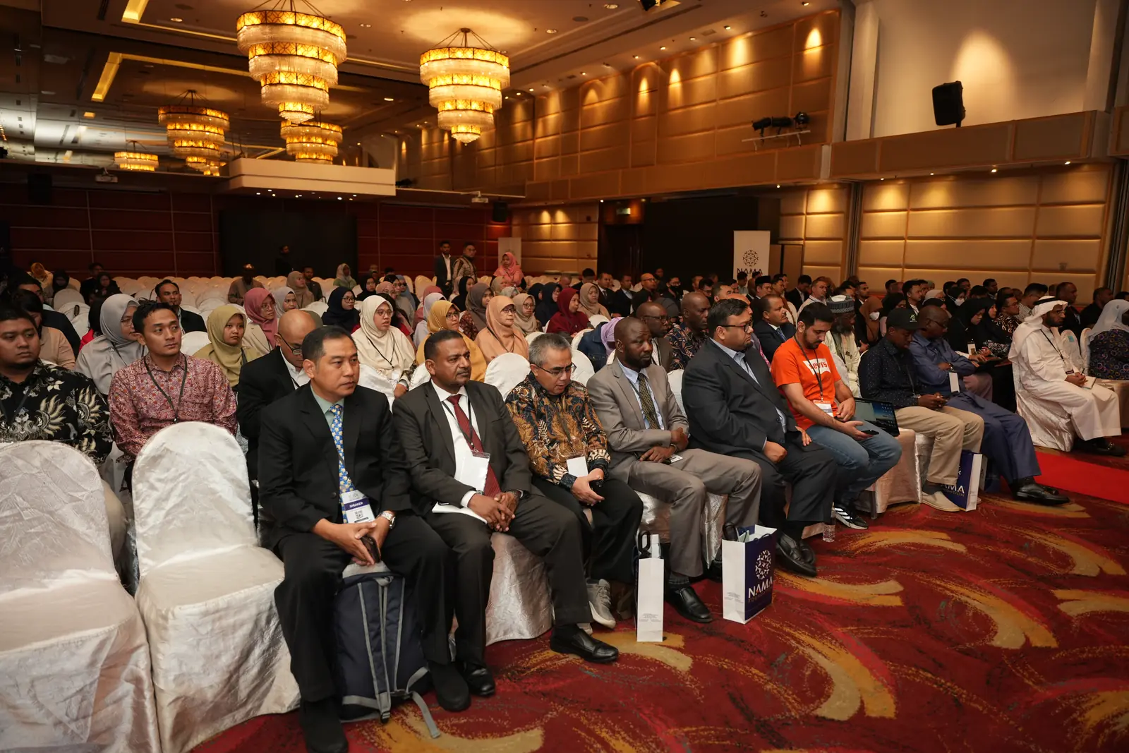 Delegates seated in rows at a NAMA Foundation event